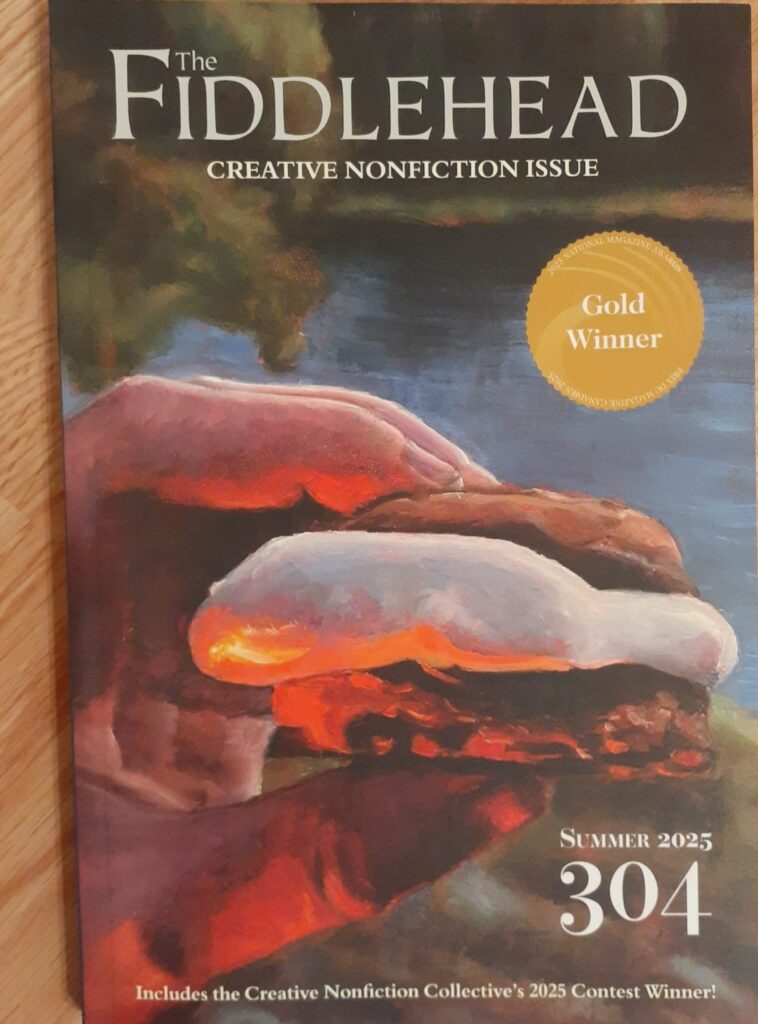 Cover of The Fiddlehead, issue 304, summer 2025, the creative nonfiction issue. Cover is a painting of a hand holding a s'more against the background of a blue lake and green trees.
